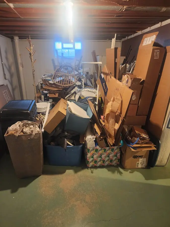 Roll-off dumpster container at job site for 15 Yard Dumpster Rental in South Portland